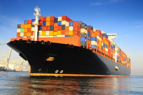 orange-black-loaded-container-ship-harbour